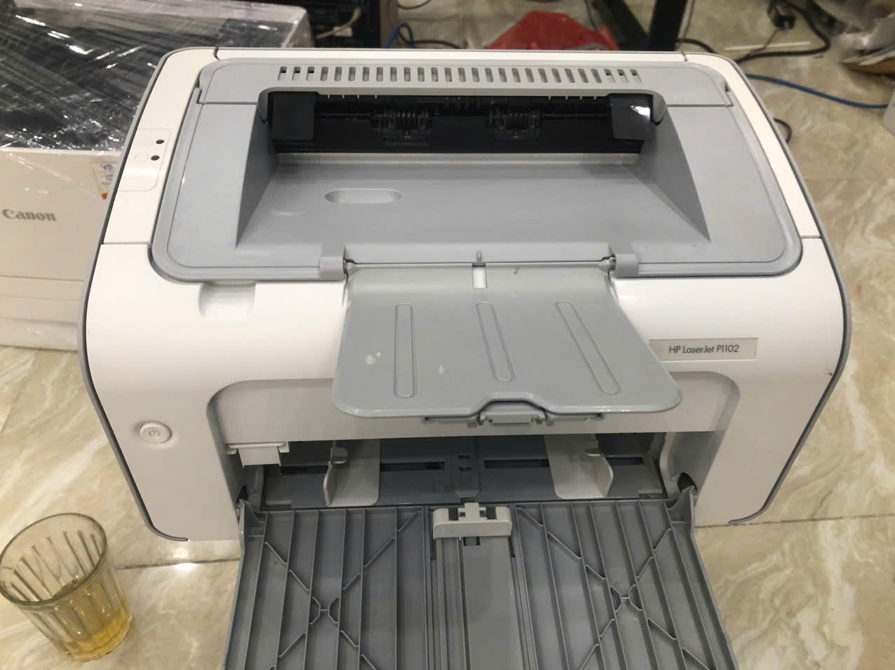 HP P1102